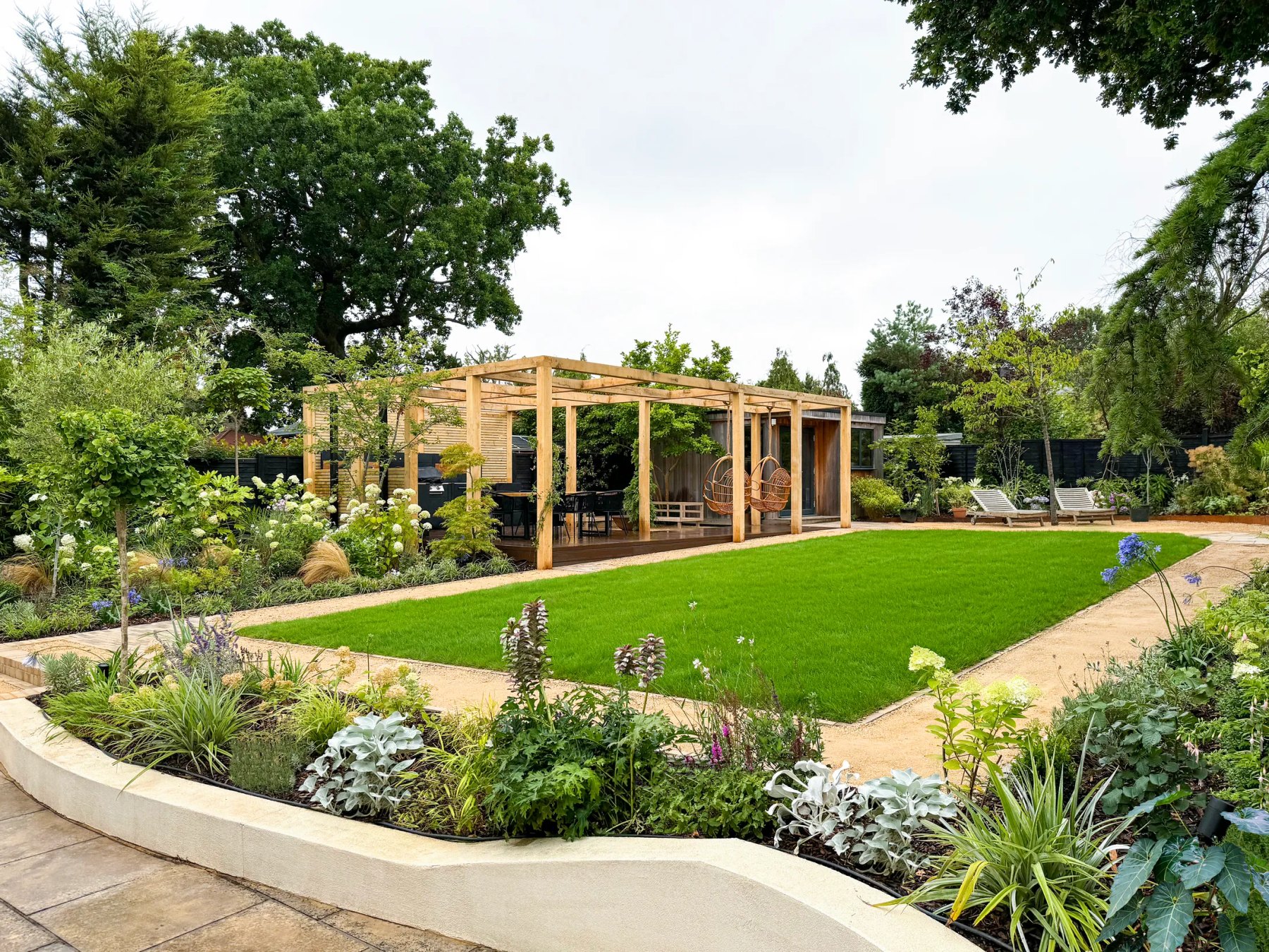 A Willow Alexander designed garden, garden room, lawn and planting